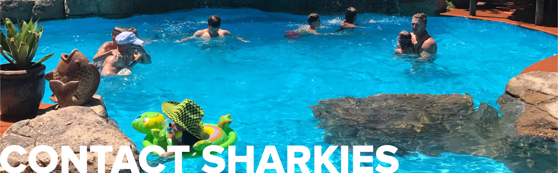 Nikki's Family swimming in pool